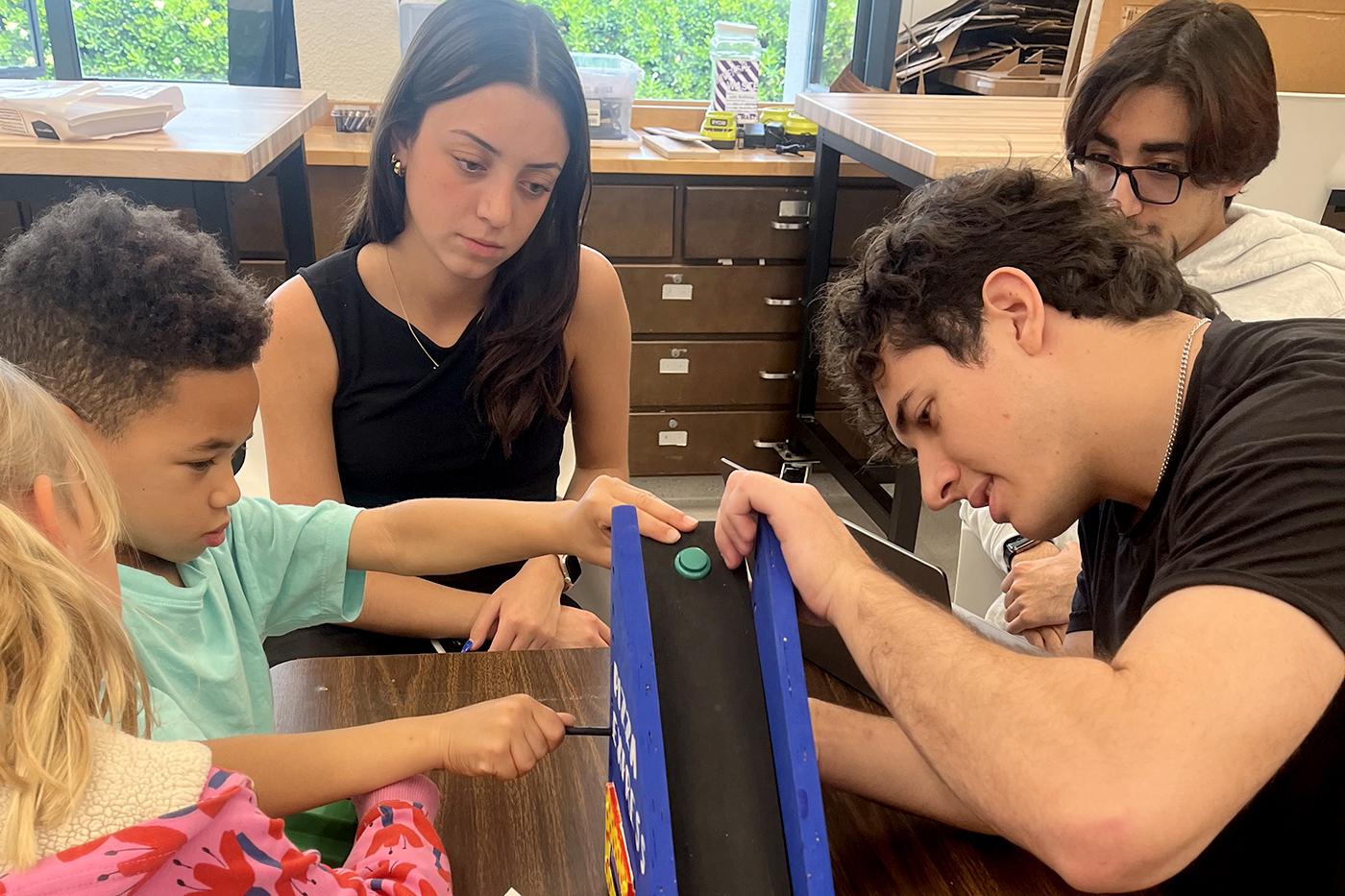 Cornerstone of Engineering students on Northeastern’s Oakland campus work with elementary school and their teachers, getting feedback and making incremental improvements